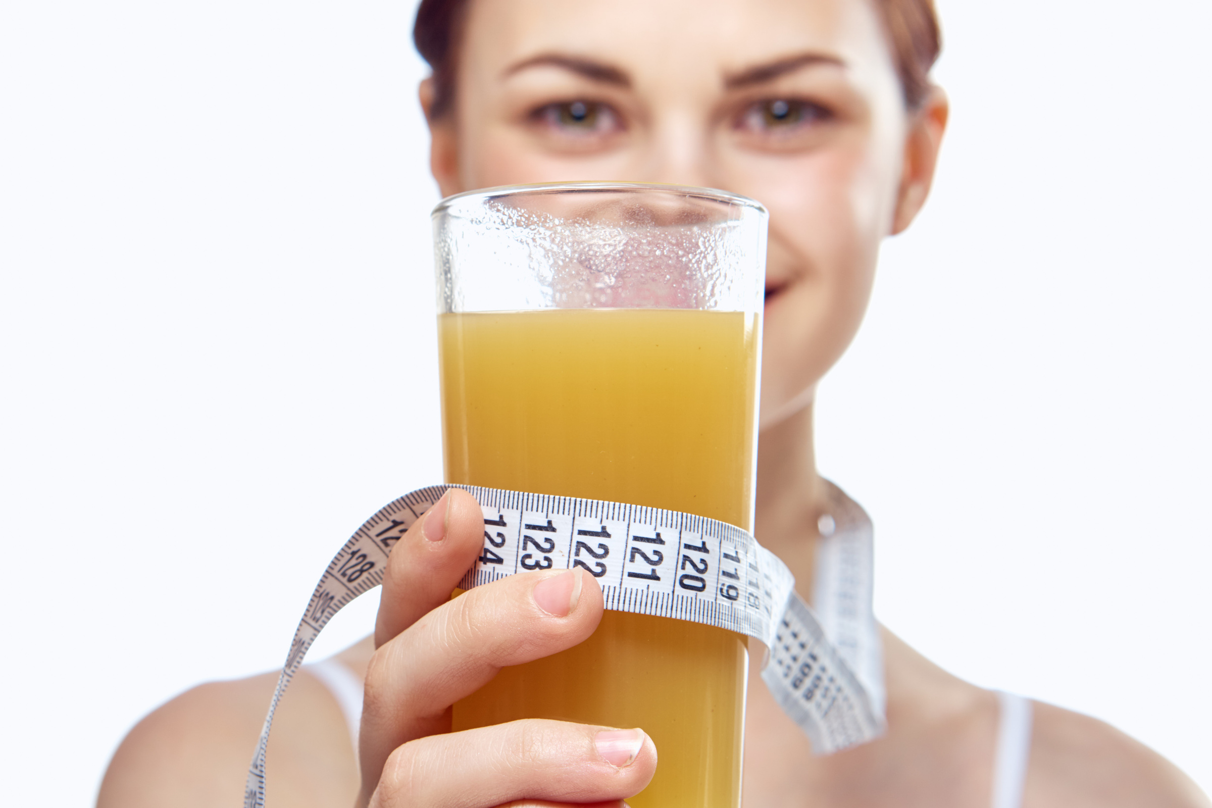 Woman with a Glass of Drink Measuring Tape Slimming Slim Figure Health
